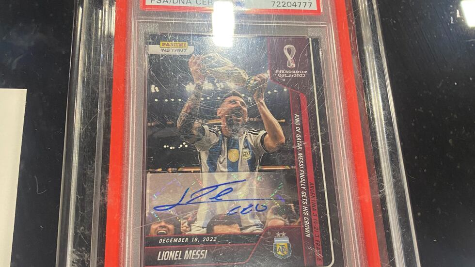A 1/1 Lionel Messi Qatar World Cup card, worth $750,000.