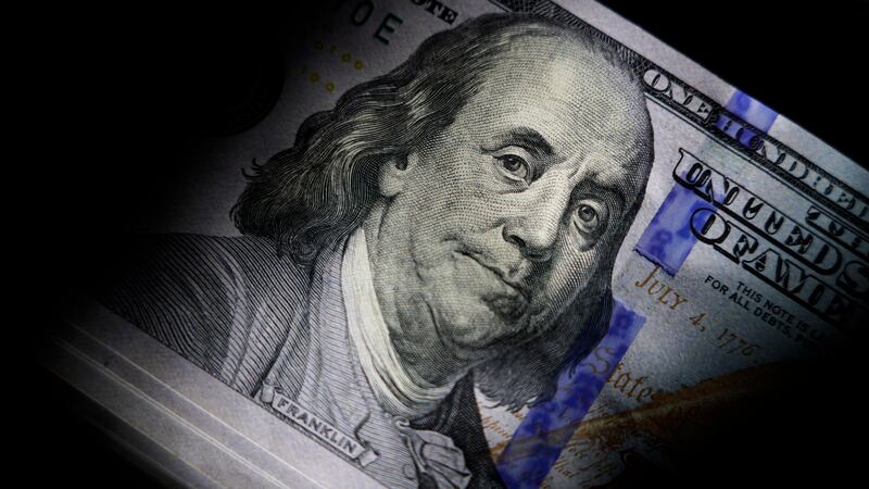 File - The likeness of Benjamin Franklin is seen on U.S. $100 bills, Thursday, July 14, 2022,...