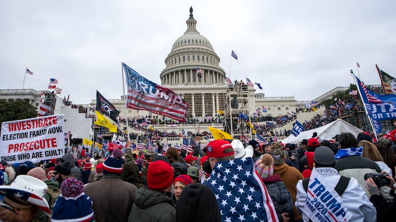 FILE - Rioters loyal to President Donald Trump rally at the U.S. Capitol in Washington on Jan....