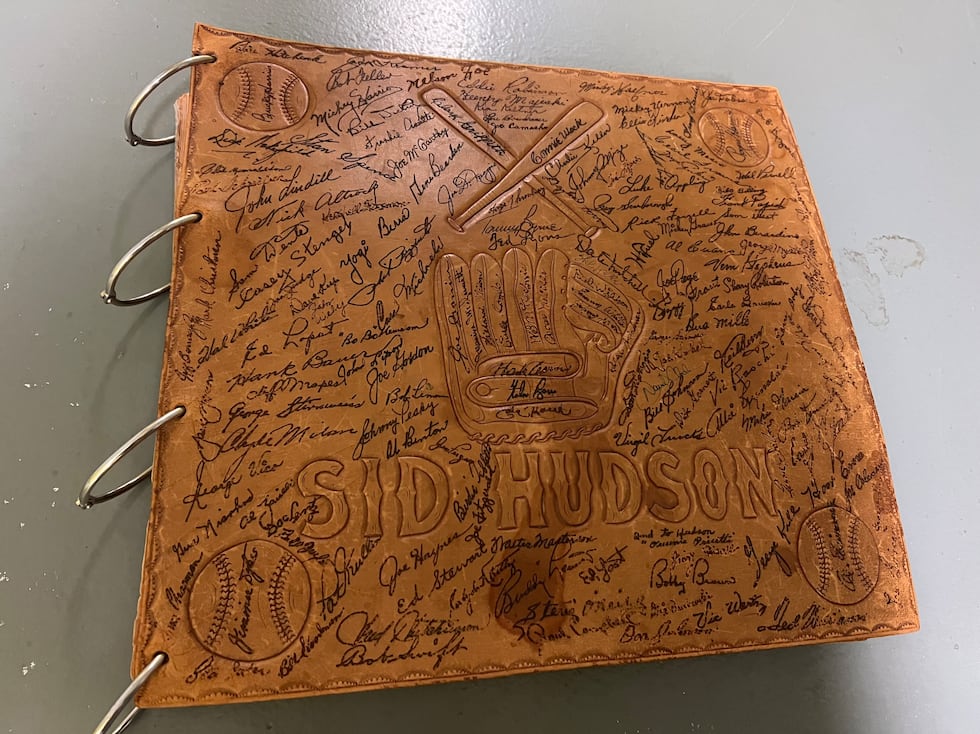 One of the family’s greatest heirlooms is the leather-bound book with signed cover from ...