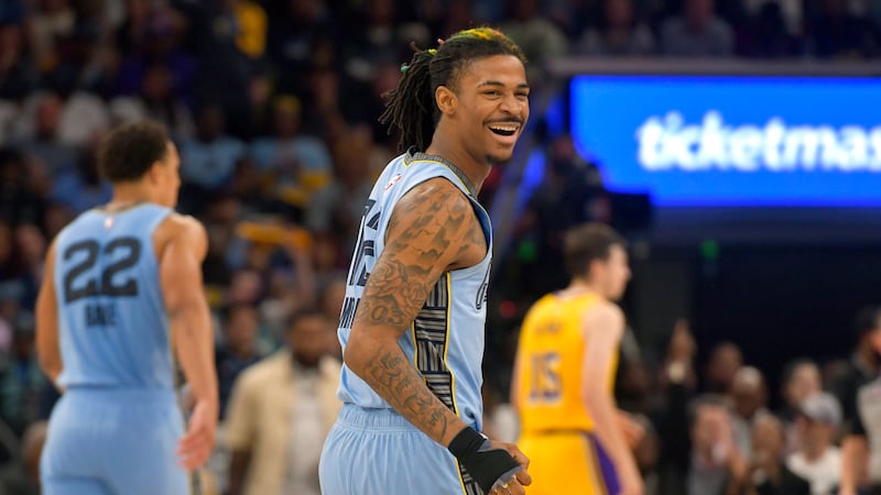Memphis Grizzlies guard Ja Morant (12) reacts during the second half of Game 5 of the team's...