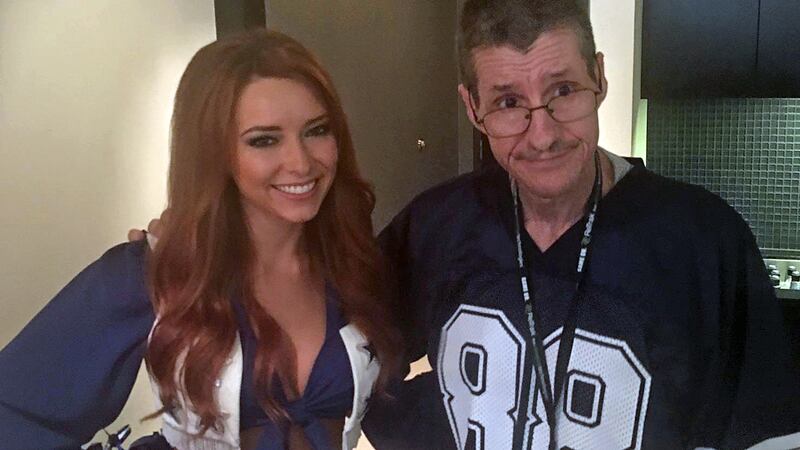 Rob Routly with one of the team's cheerleaders. (Courtesy photo)