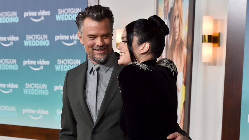 FILE - Josh Duhamel, left, and Audra Mari arrive at the premiere of "Shotgun Wedding,"...