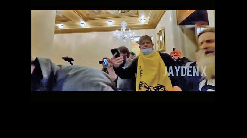 A frame grab from a video included as part of an arrest warrant affidavit that shows Chris...