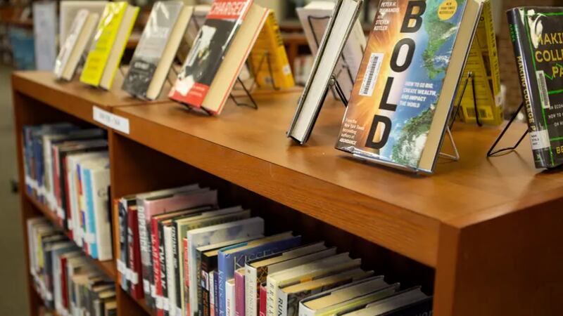 Books at Vandegrift High School's library on March 2, 2022. A new Texas law requires book...